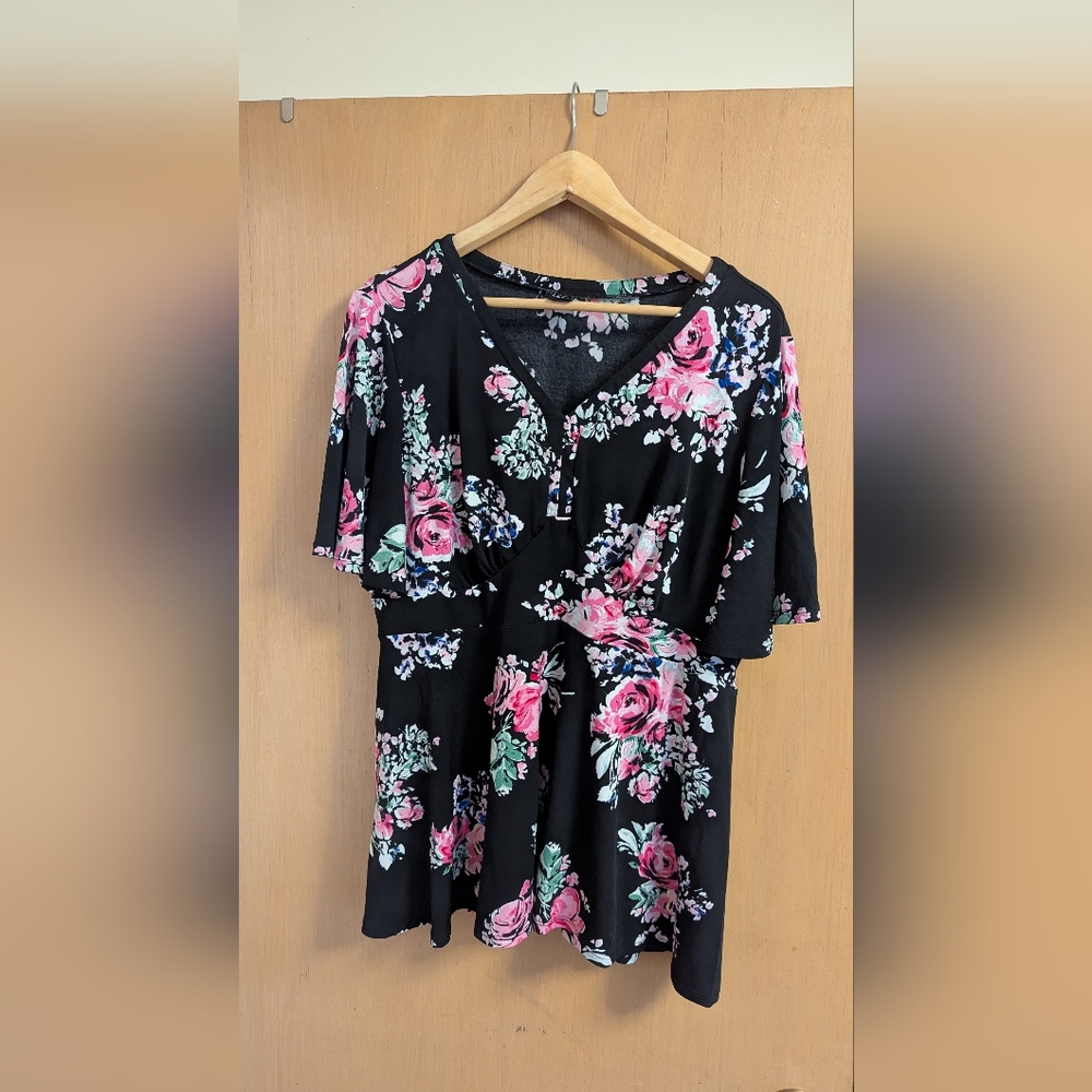 Empire waist peplum top. Excellent condition
